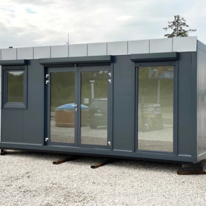 Contenedor de oficina premium de 6 m en gris con grandes ventanales