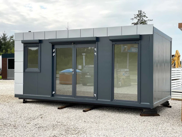 Contenedor de oficina premium de 6 m en gris con grandes ventanales